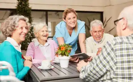 team of seniors with caregiver