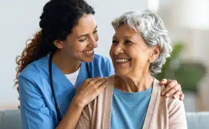 smiling Senior with a caregiver