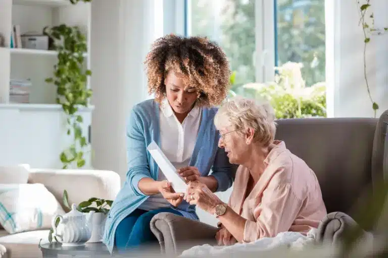 senior reading report along with a nurse